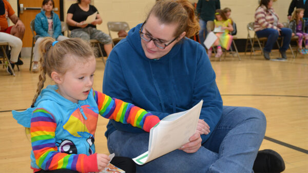 woman and child reading